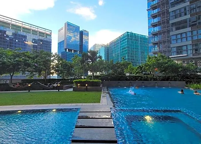 Отель Uptown Parksuites Tower 1 At Bgc - Staycations Up Above 12 5*