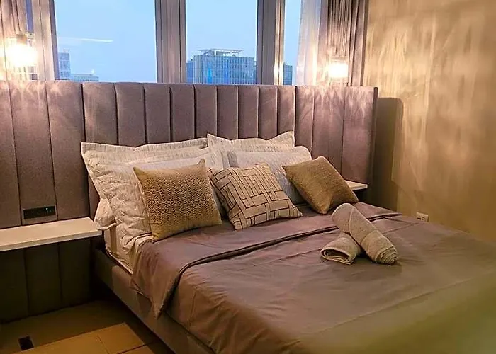 Отель Uptown Parksuites Tower 1 At Bgc - Staycations Up Above 12